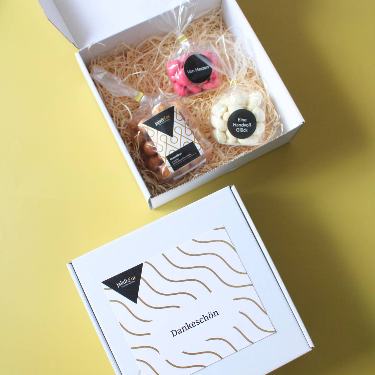 Dankeschön Geschenkbox geöffnet mit Inhalt